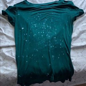 green and light blue shirt